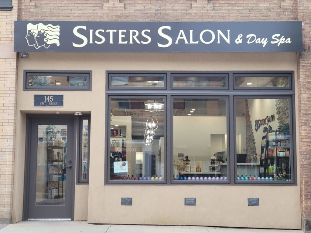 Sisters Salon Outside Sign